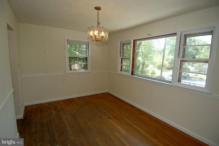 12003 Lafayette Court Silver Spring, MD 20902 - Photo 15 of 22 a view of empty room with window