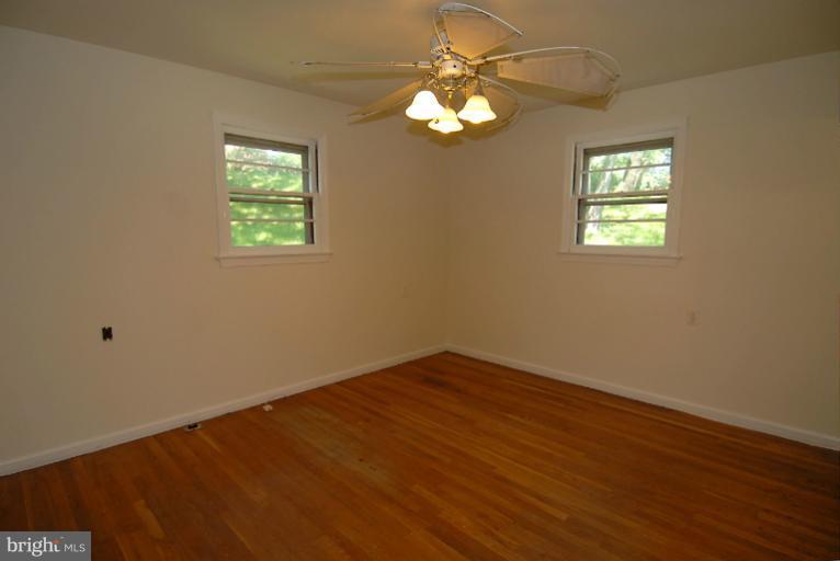 12003 Lafayette Court Silver Spring, MD 20902 - Photo 17 of 22 a view of empty room with window