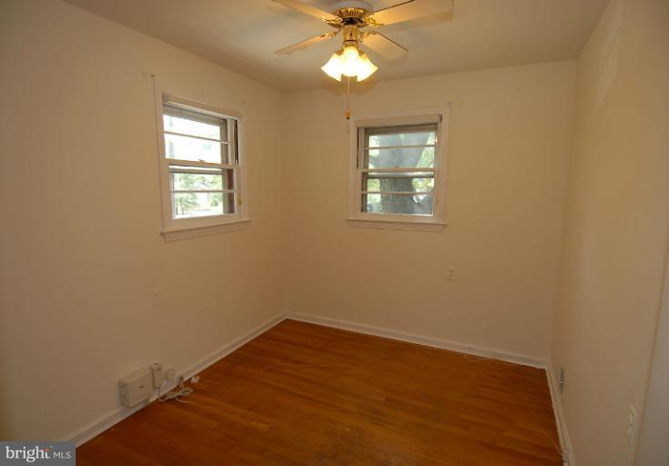 12003 Lafayette Court Silver Spring, MD 20902 - Photo 19 of 22 an empty room with a window
