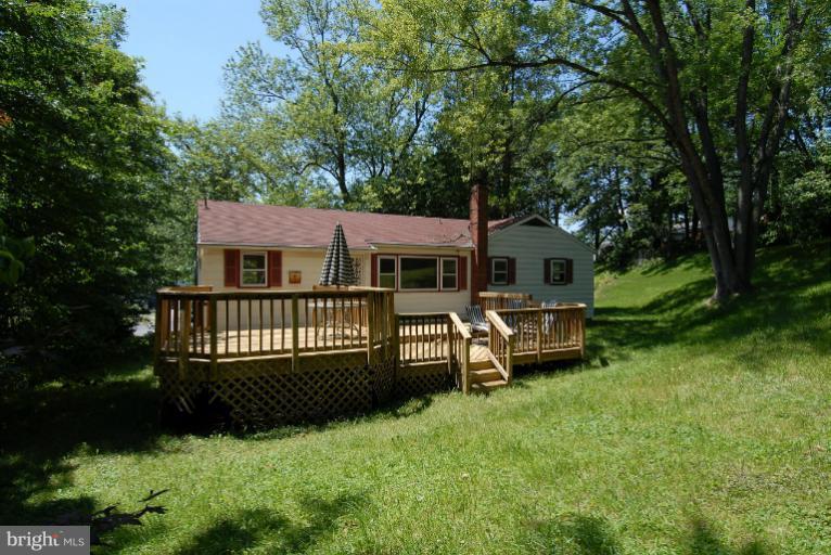 12003 Lafayette Court Silver Spring, MD 20902 - Photo 3 of 22 a view of house with garden and deck