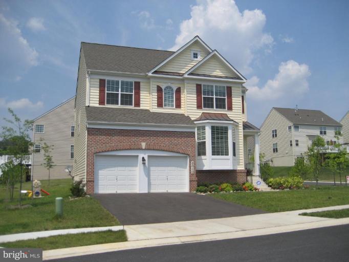 2010 Myrtlewood Road Baltimore, MD 21209 - Photo 1 of 11 front view of a house with a yard
