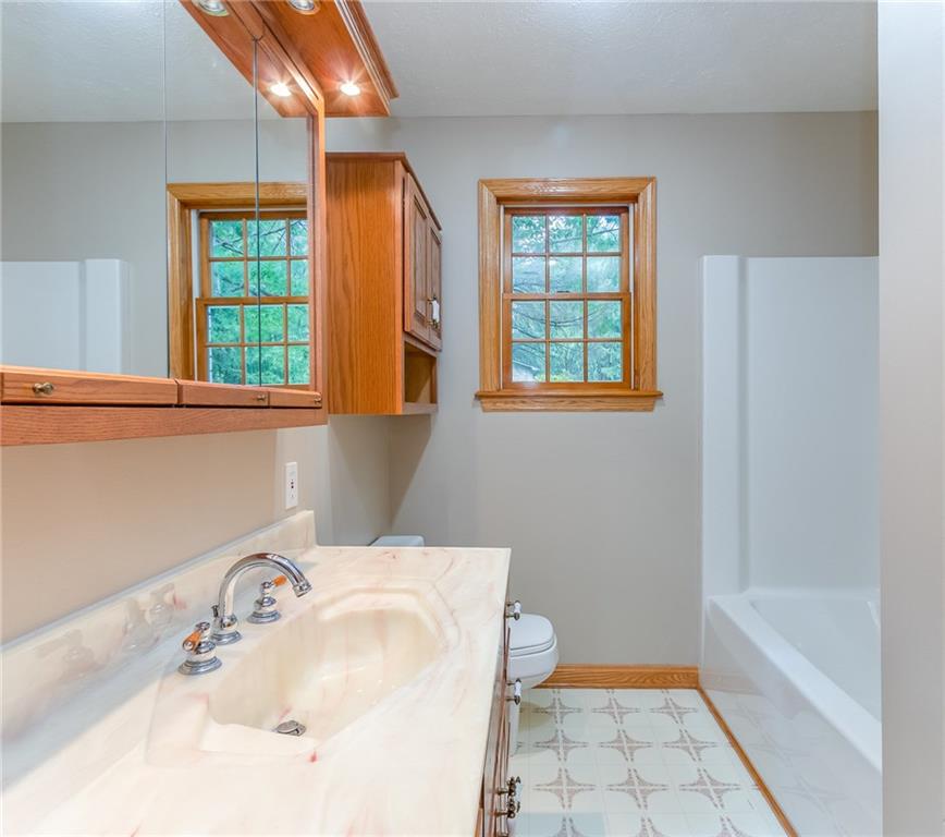 156 West Mowry Road Monaca, PA 15061 - Photo 17 of 25 Main level full bath is between bedroom 2 and 3