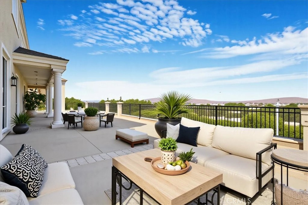 13097 Sage Hen Road Victorville, CA 92395 - Photo 11 of 63 a view of a patio with couches and potted plants
