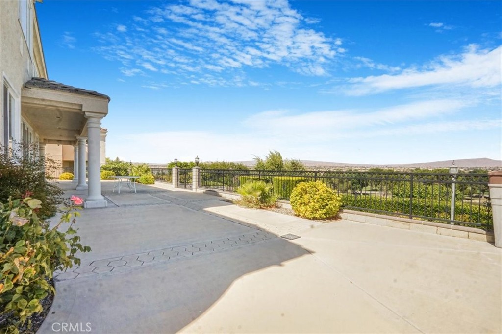 13097 Sage Hen Road Victorville, CA 92395 - Photo 12 of 63 a view of a terrace with a garden