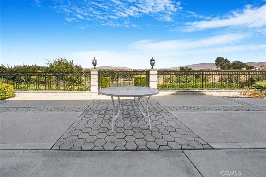 13097 Sage Hen Road Victorville, CA 92395 - Photo 13 of 63 a view of a pathway with a yard