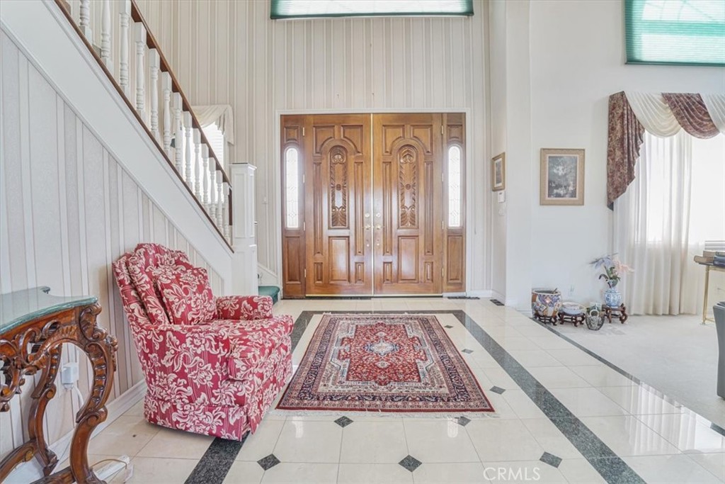 13097 Sage Hen Road Victorville, CA 92395 - Photo 22 of 63 a view of a hallway with windows