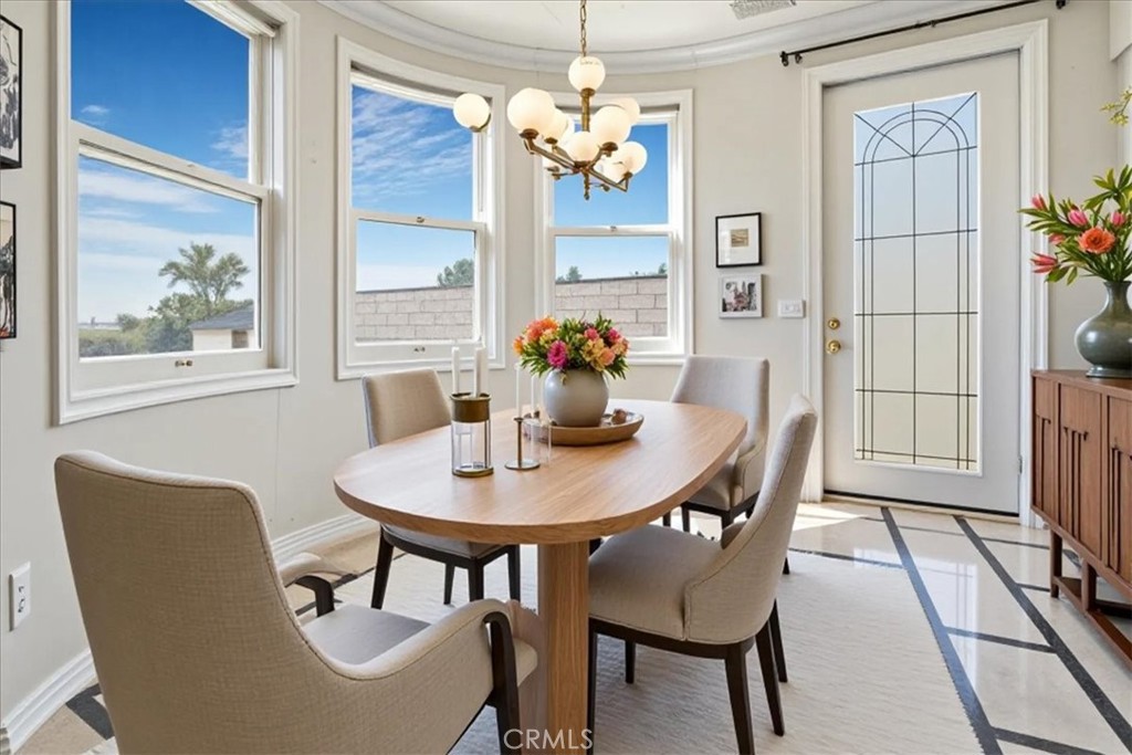 13097 Sage Hen Road Victorville, CA 92395 - Photo 42 of 63 a dining room with furniture and window