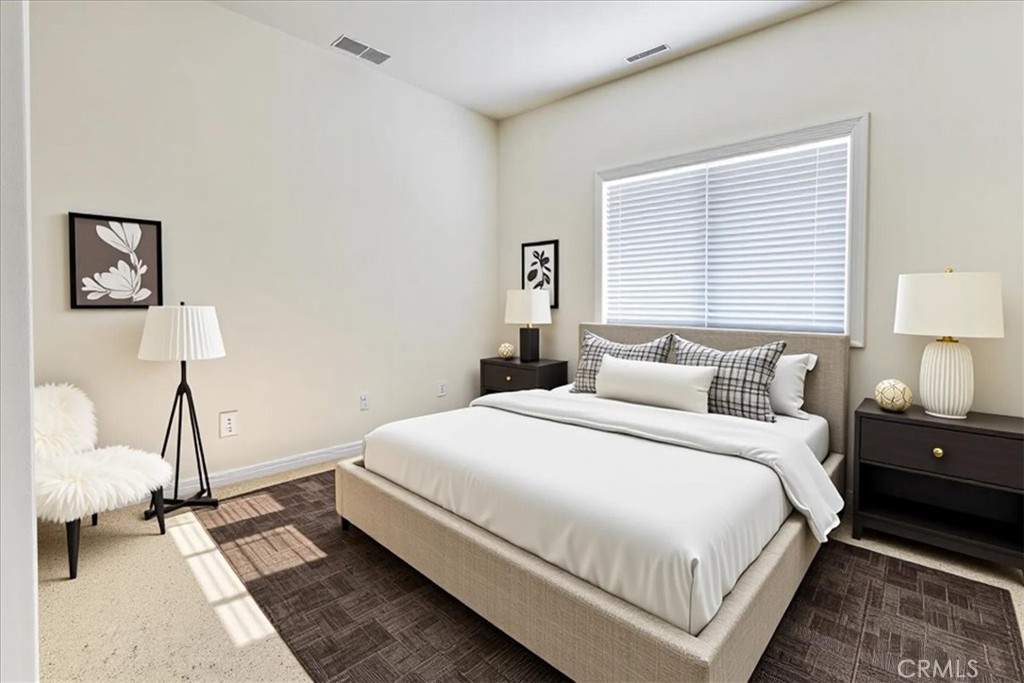 13097 Sage Hen Road Victorville, CA 92395 - Photo 43 of 63 a bed room with a bed and a lamp