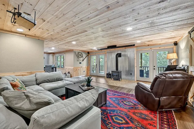 a view of balcony with couch and chairs