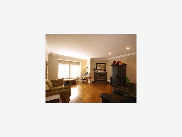118 Dwight Road Burlingame, CA 94010 - Photo 2 of 9 a living room with furniture and a flat screen tv