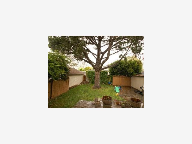 118 Dwight Road Burlingame, CA 94010 - Photo 4 of 9 a picture of a bench in front of a house