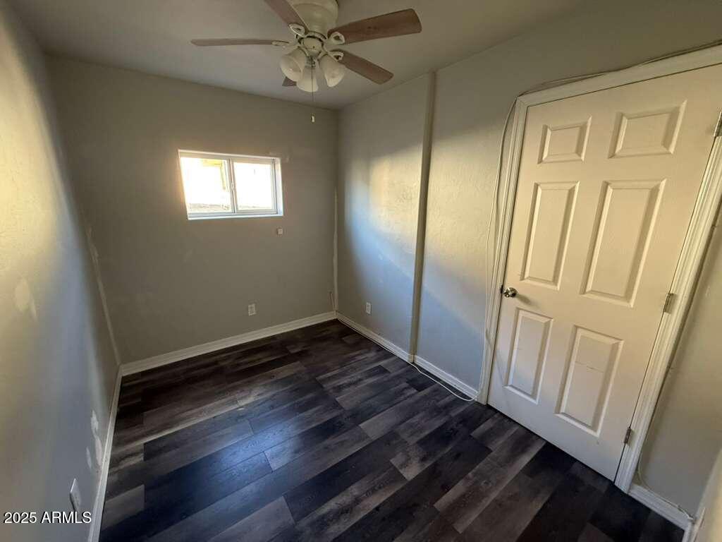 806 East 7th Street Douglas, AZ 85607 - Photo 6 of 18 wooden floor in an empty room