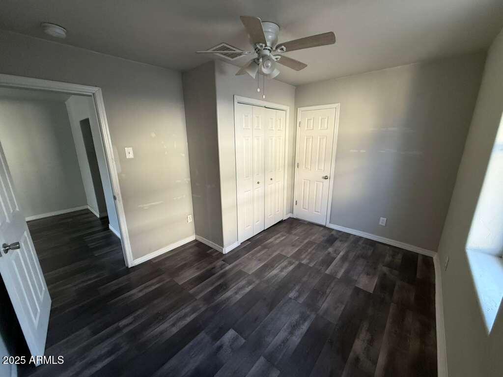 806 East 7th Street Douglas, AZ 85607 - Photo 9 of 18 a view of an empty room and wooden floor