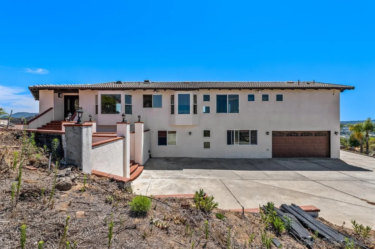 2155 Vista Valley Rim Place El Cajon, CA 92019 - Photo 2 of 61 a view of a house with a patio