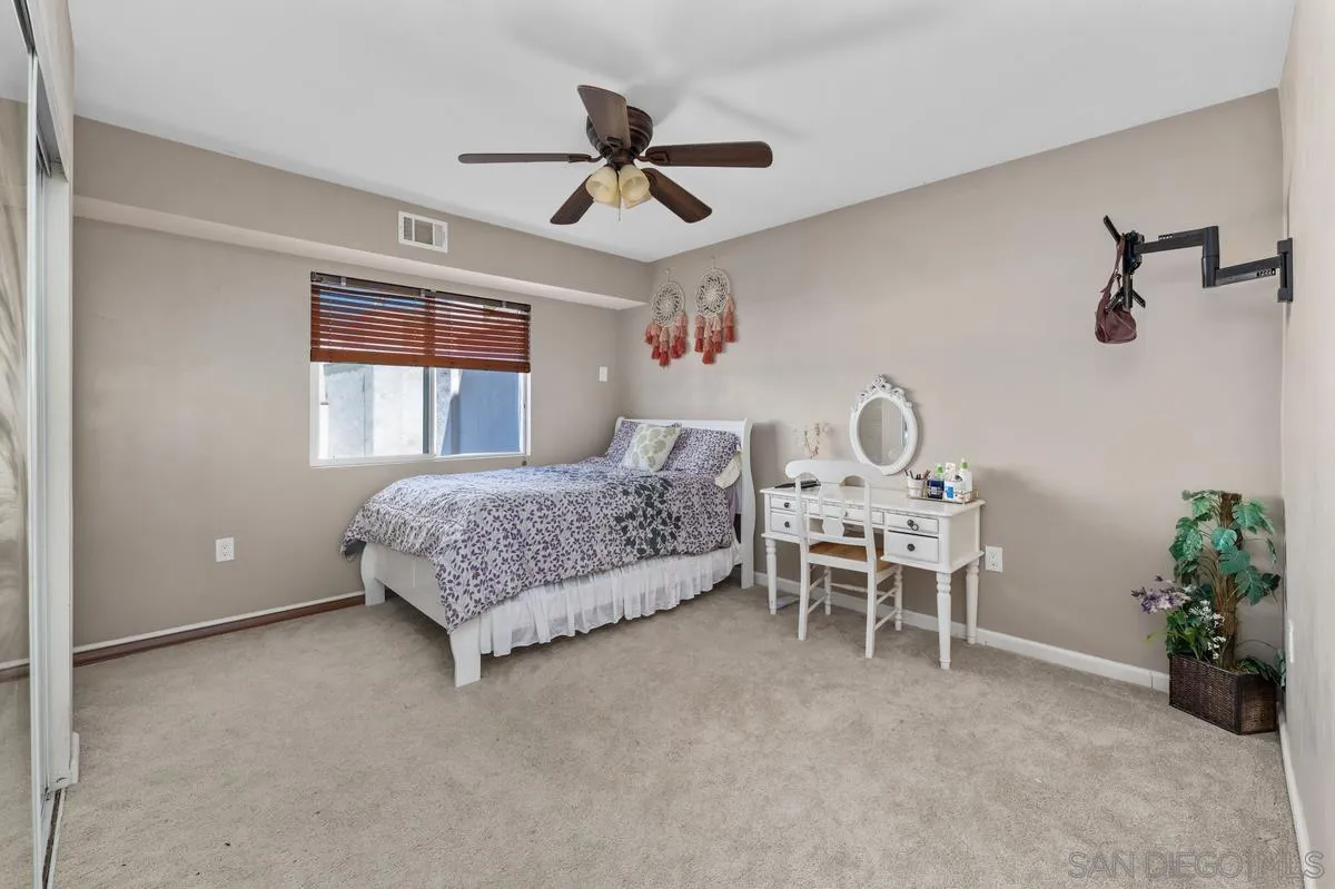 2155 Vista Valley Rim Place El Cajon, CA 92019 - Photo 27 of 61 a living room with furniture and a table