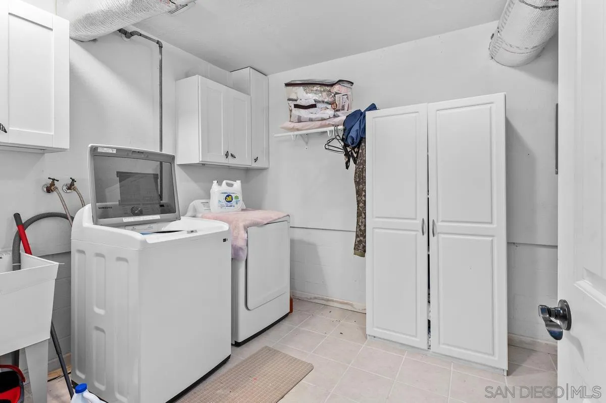 2155 Vista Valley Rim Place El Cajon, CA 92019 - Photo 30 of 61 a view of a storage & utility room with dryer and washer
