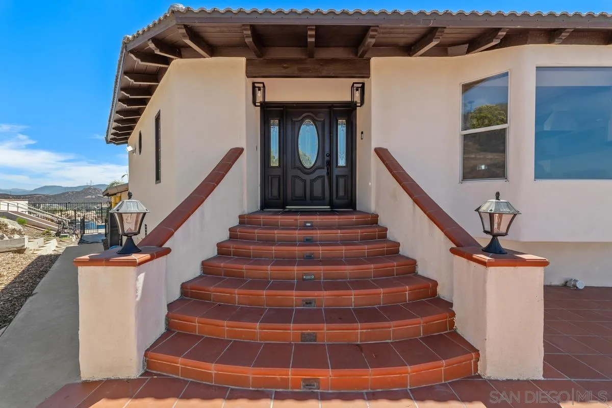 2155 Vista Valley Rim Place El Cajon, CA 92019 - Photo 3 of 61 a view of entryway and hall with wooden floor