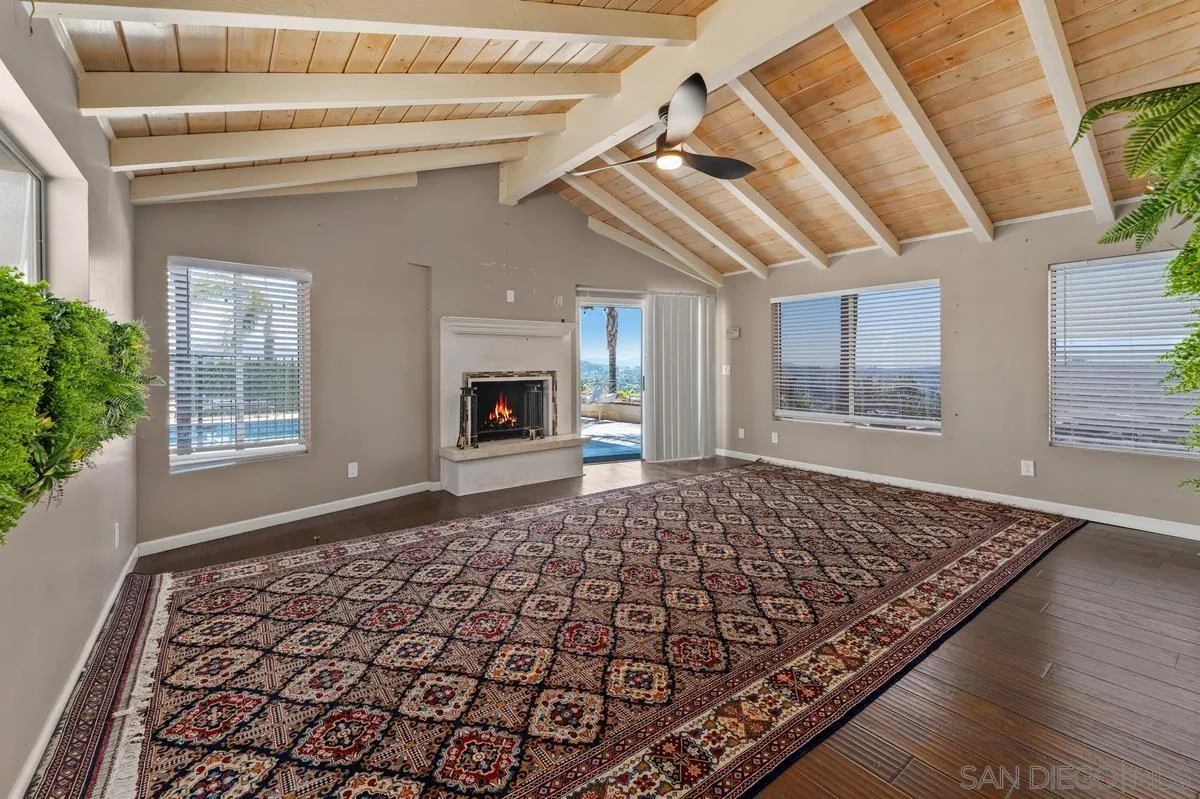 2155 Vista Valley Rim Place El Cajon, CA 92019 - Photo 32 of 61 wooden floor in an empty room with a fireplace