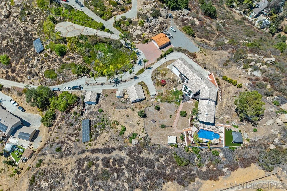 2155 Vista Valley Rim Place El Cajon, CA 92019 - Photo 39 of 61 an aerial view of a house with a yard