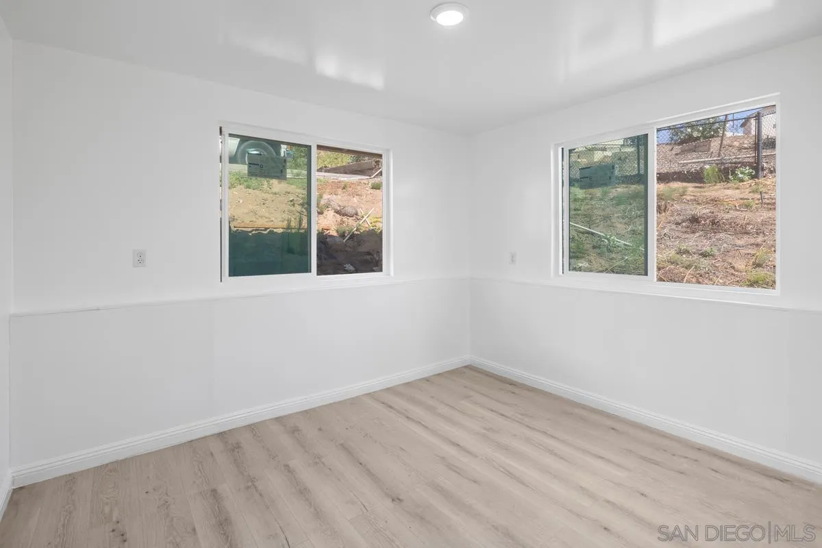 2155 Vista Valley Rim Place El Cajon, CA 92019 - Photo 45 of 61 an empty room with a window