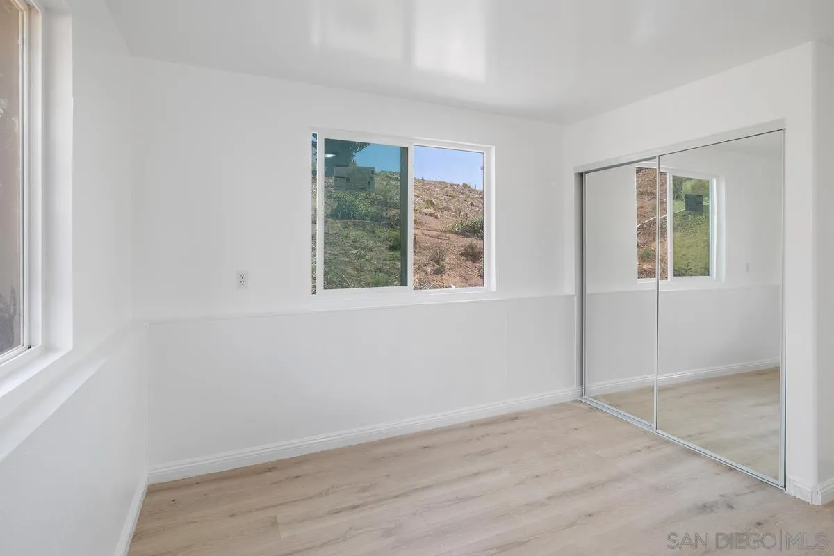 2155 Vista Valley Rim Place El Cajon, CA 92019 - Photo 46 of 61 an empty room with windows