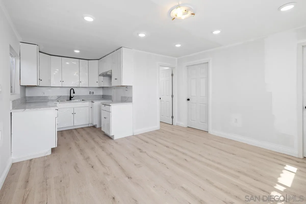 2155 Vista Valley Rim Place El Cajon, CA 92019 - Photo 49 of 61 a view of kitchen with wooden floor