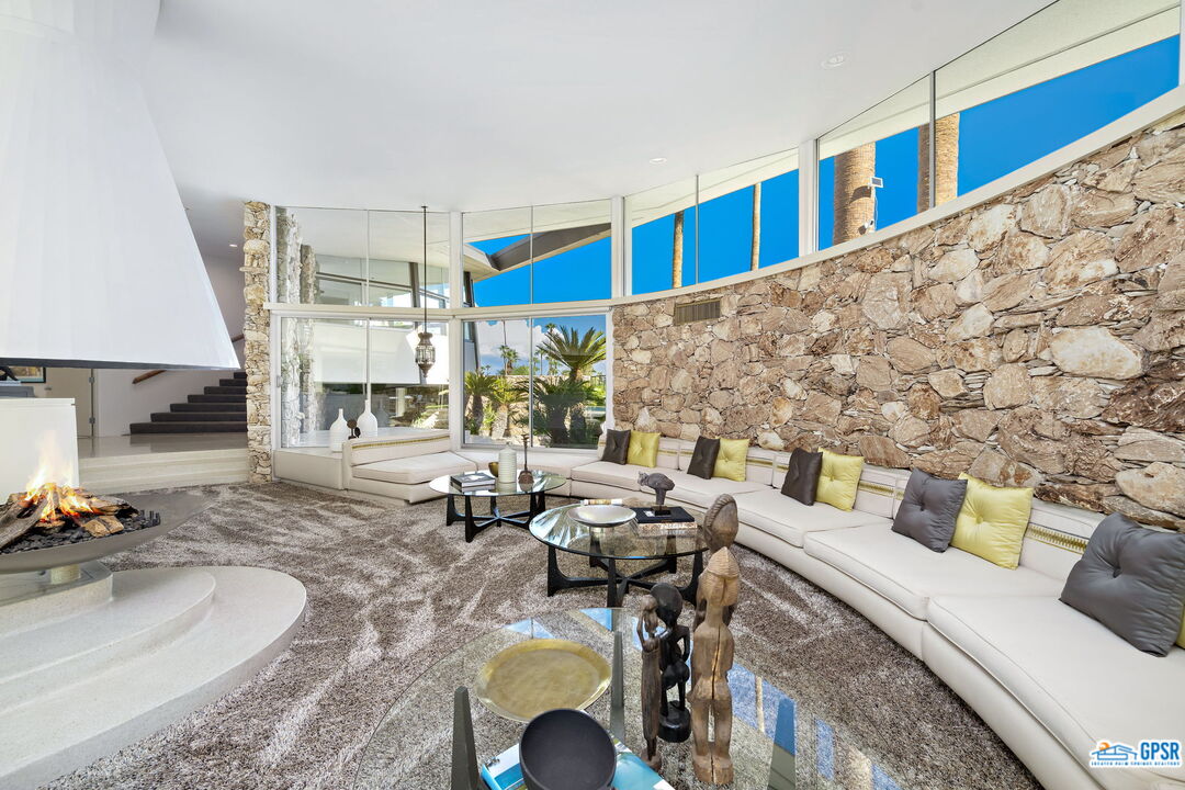 1350 Ladera Circle Palm Springs, CA 92262 - Photo 12 of 54 a living room with furniture and a couch
