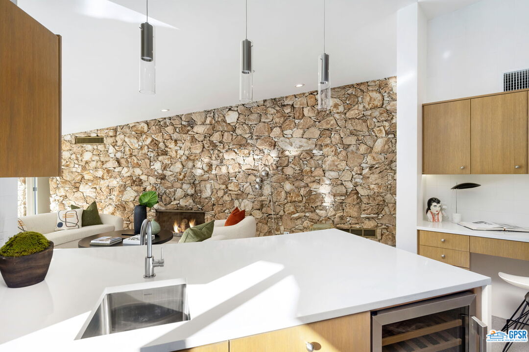 1350 Ladera Circle Palm Springs, CA 92262 - Photo 23 of 54 a bathroom with a sink and a mirror