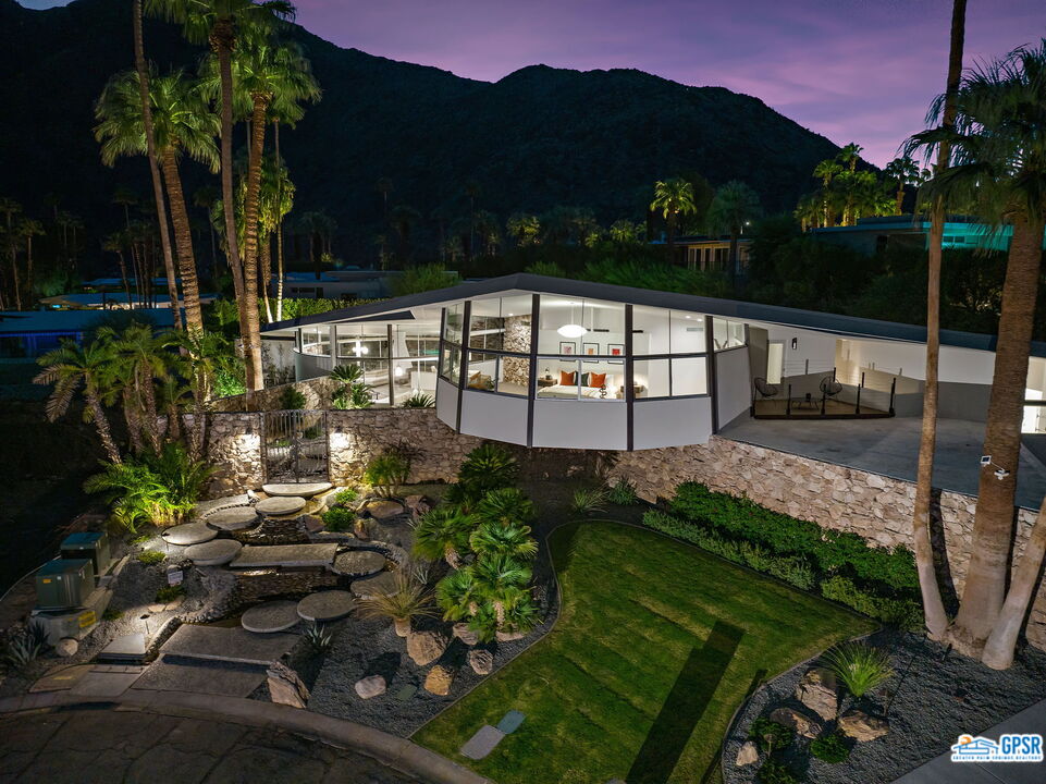 1350 Ladera Circle Palm Springs, CA 92262 - Photo 4 of 54 a view of a lake with a garden