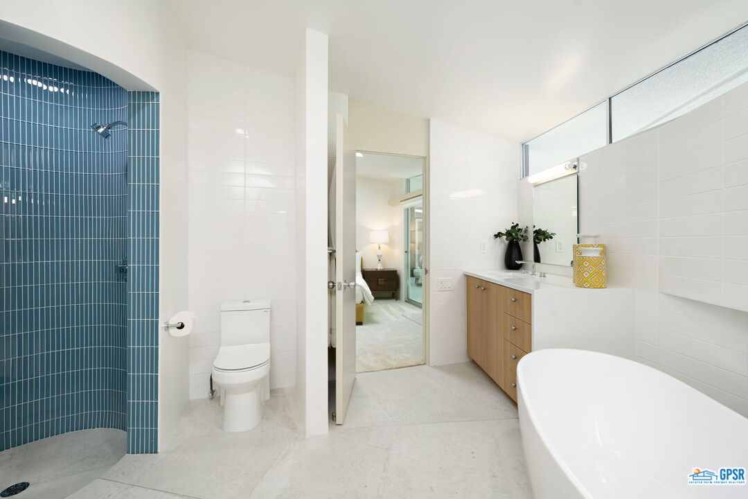 1350 Ladera Circle Palm Springs, CA 92262 - Photo 41 of 54 a bathroom with a sink a toilet and shower