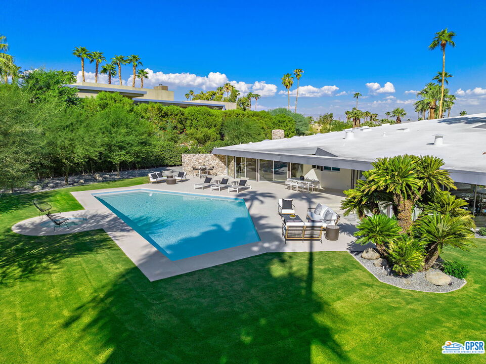 1350 Ladera Circle Palm Springs, CA 92262 - Photo 46 of 54 a view of a house with a yard