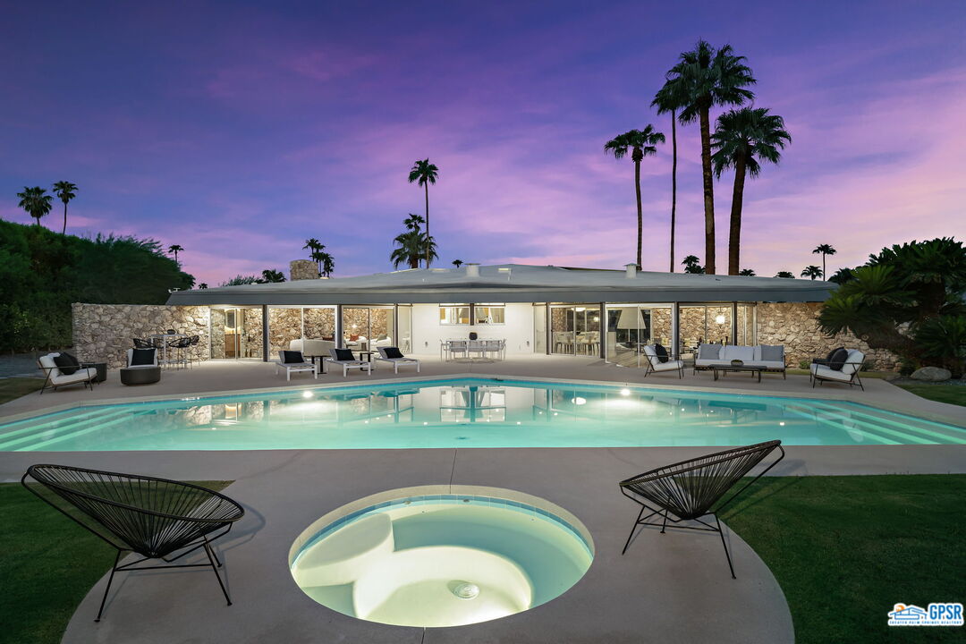 1350 Ladera Circle Palm Springs, CA 92262 - Photo 51 of 54 a view of a swimming pool with a patio