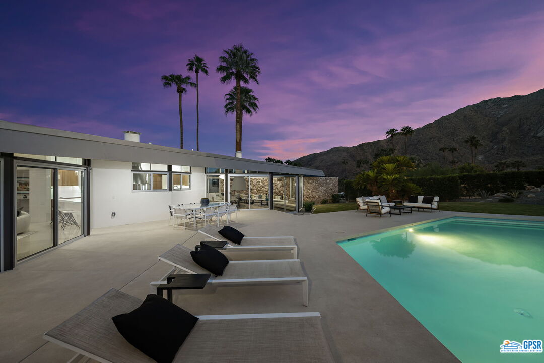 1350 Ladera Circle Palm Springs, CA 92262 - Photo 54 of 54 a view of a house with swimming pool yard and sitting area