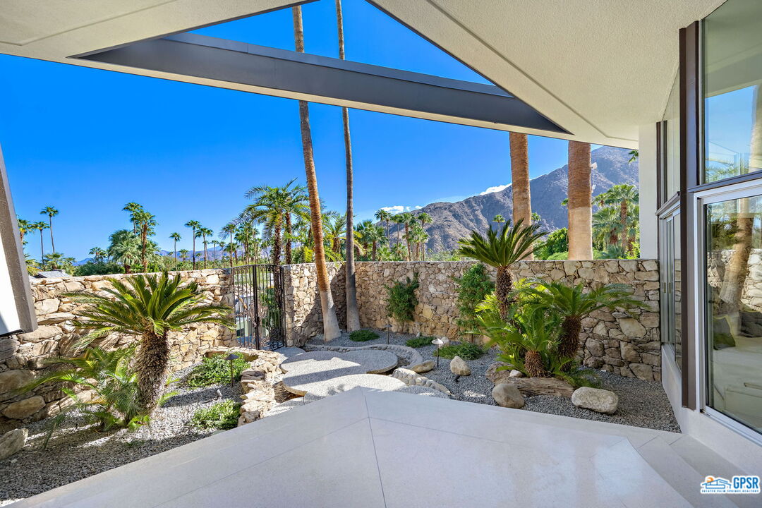 1350 Ladera Circle Palm Springs, CA 92262 - Photo 9 of 54 a view of a street with potted plants