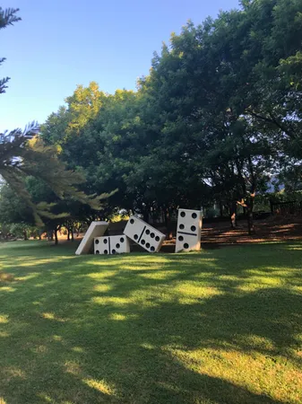 a view of a bench next to a yard