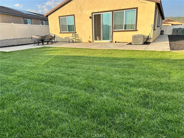 a front view of house with yard
