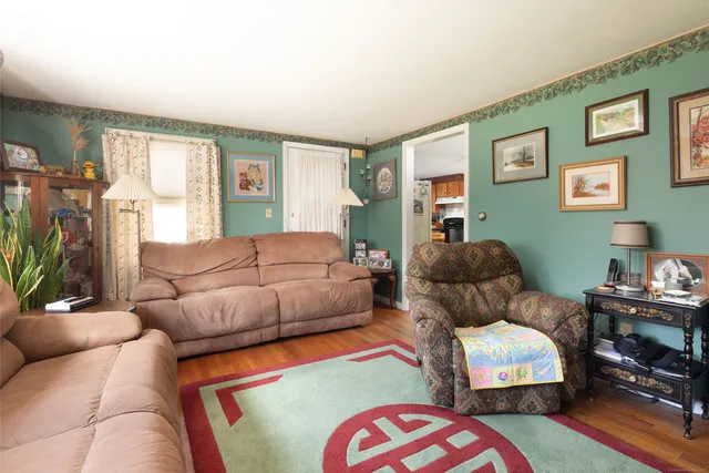 a living room with furniture and a couch