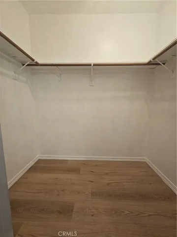 a front view of a house with a yard and fountain