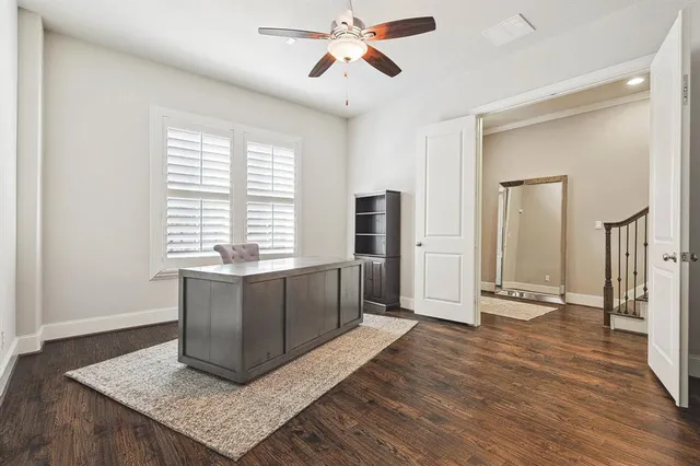 a view of kitchen with sink and wooden floor