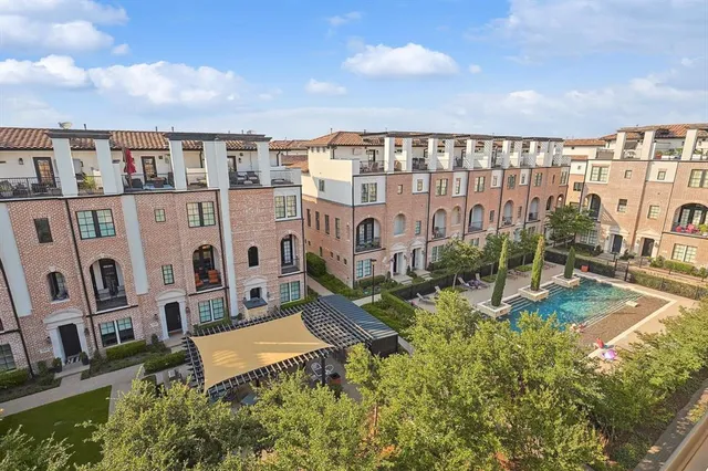 a view of a city with tall buildings