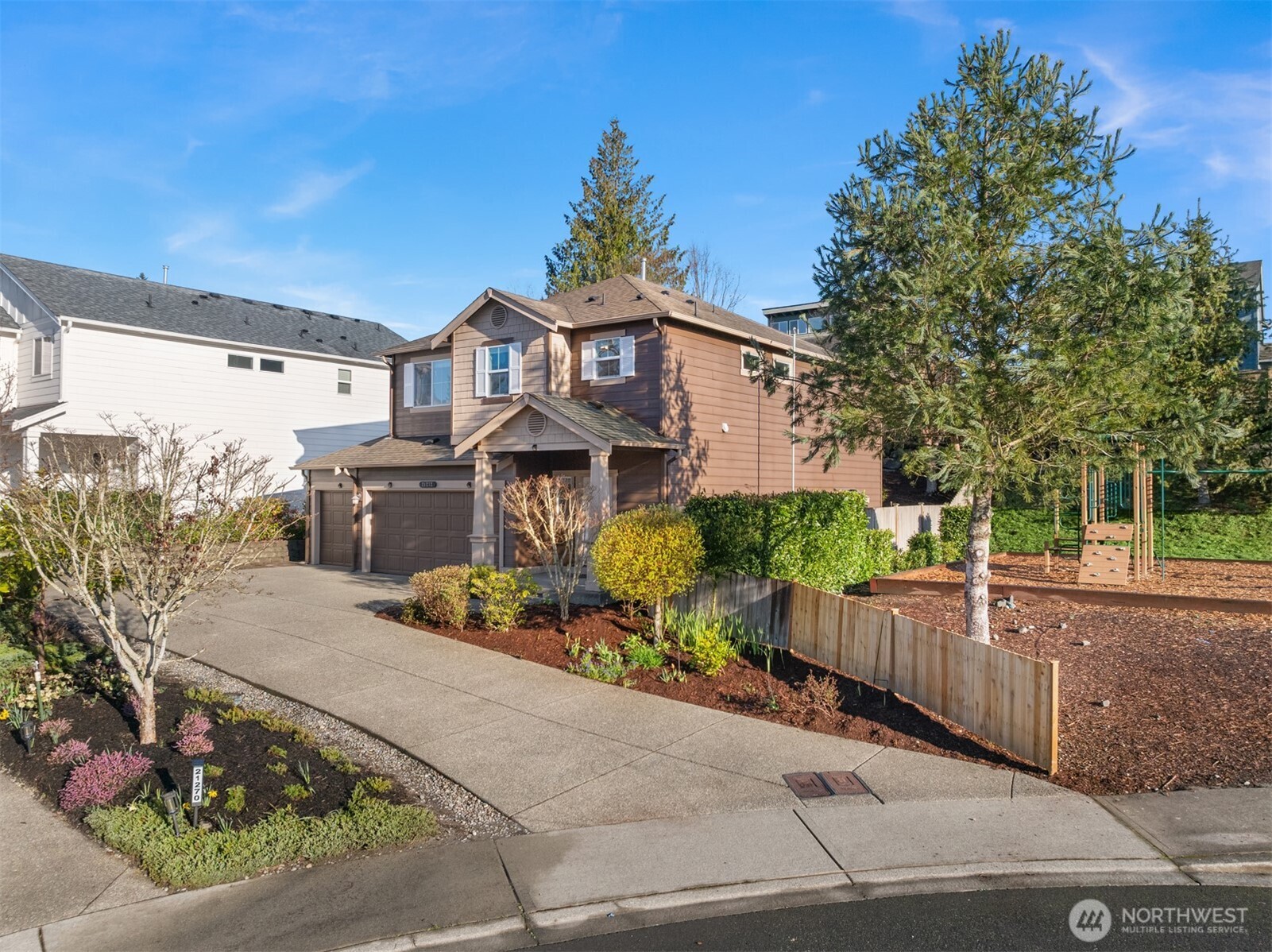 21272 Southeast 275th Court Maple Valley, WA 98038 - Photo 30 of 40 front view of a house with a street