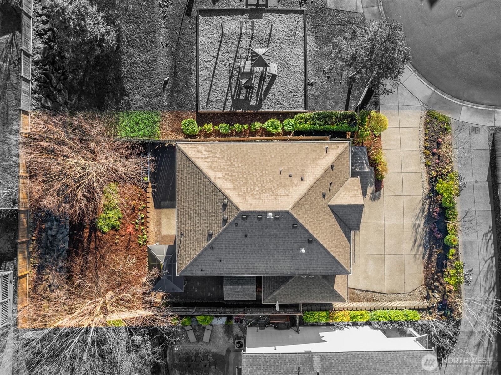 21272 Southeast 275th Court Maple Valley, WA 98038 - Photo 32 of 40 an aerial view of a house with a garden