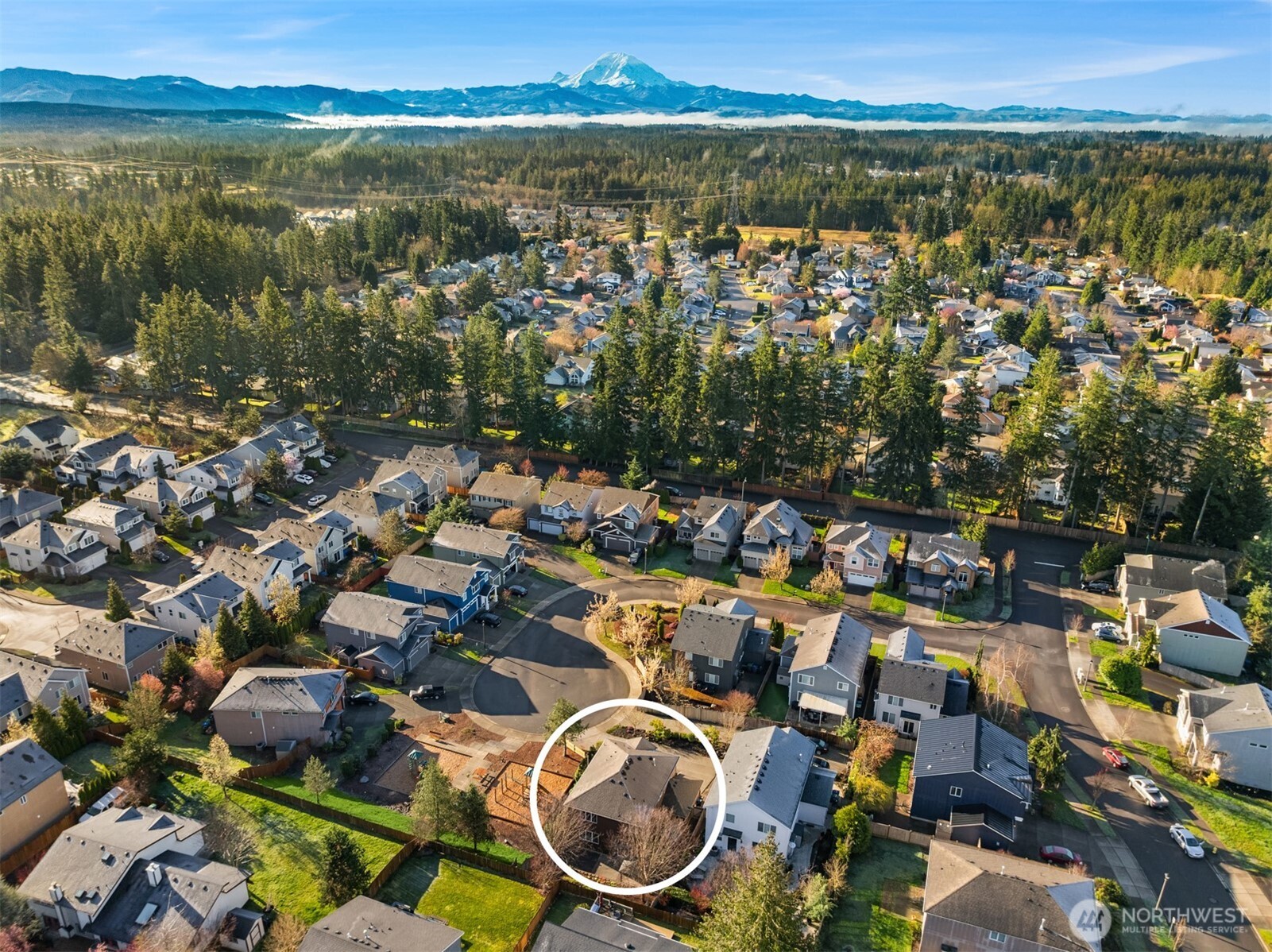 21272 Southeast 275th Court Maple Valley, WA 98038 - Photo 36 of 40 an aerial view of residential house with outdoor space and lake view