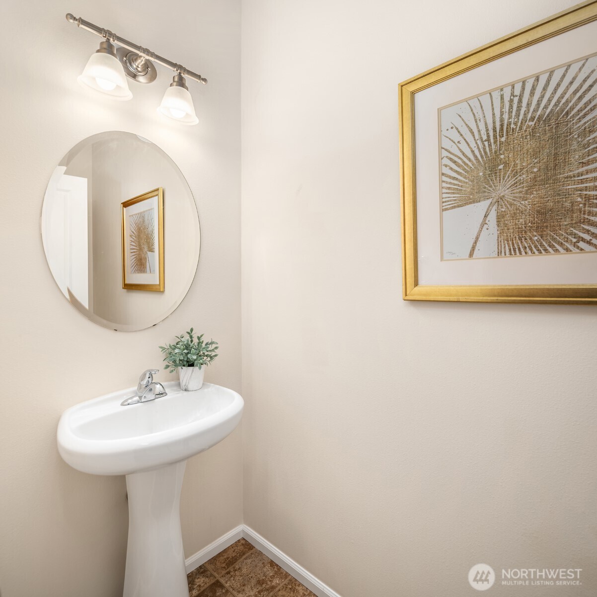 21272 Southeast 275th Court Maple Valley, WA 98038 - Photo 6 of 40 a bathroom with a sink and a mirror