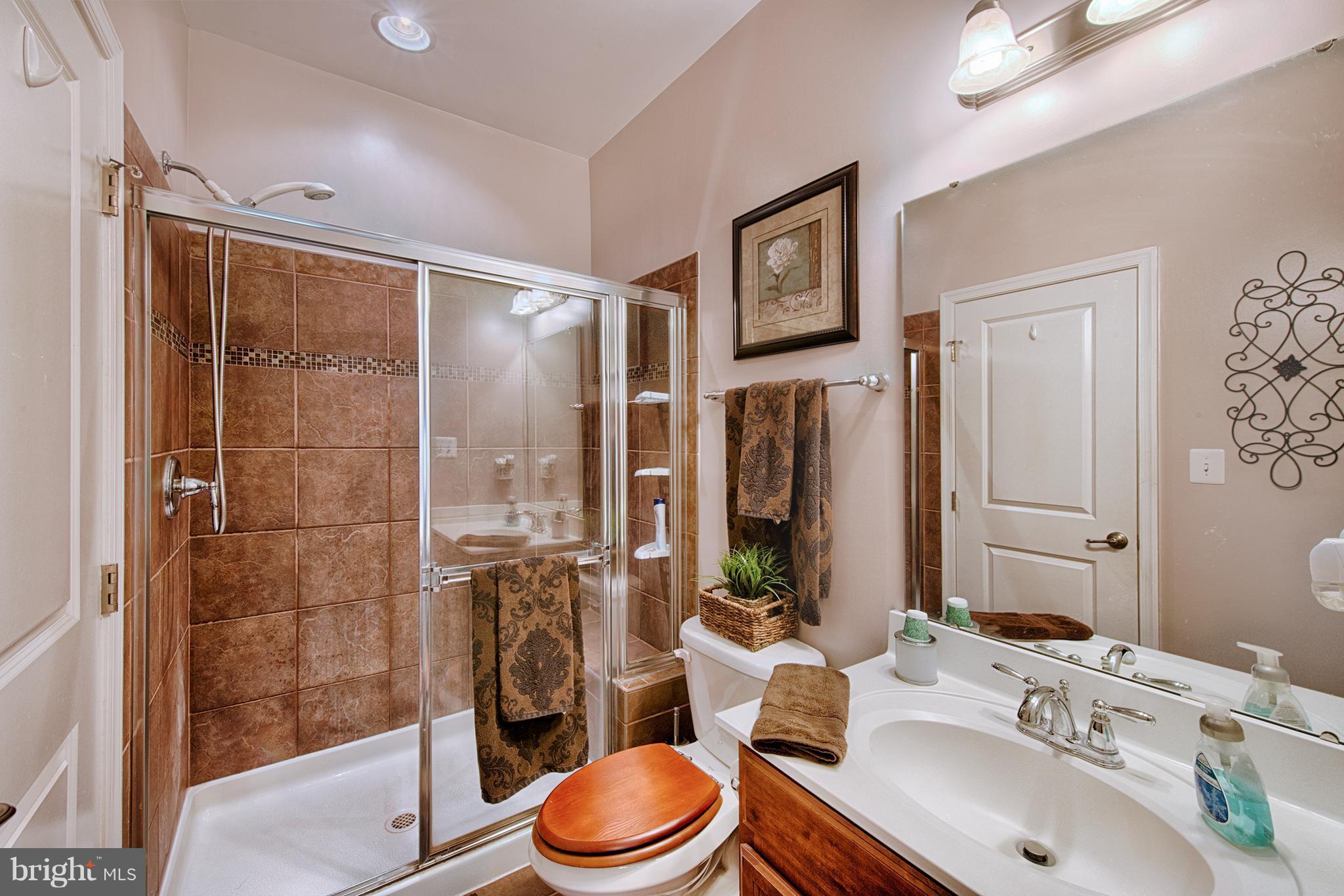 5602 Country Farm Road White Marsh, MD 21162 - Photo 13 of 30 1st Floor Master Bath w/ guest entrance as well.