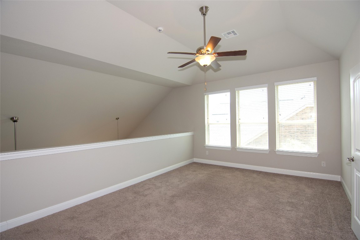 3901 Rhythmic Drive Pflugerville, TX 78660 - Photo 21 of 40 an empty room with a window and a fan