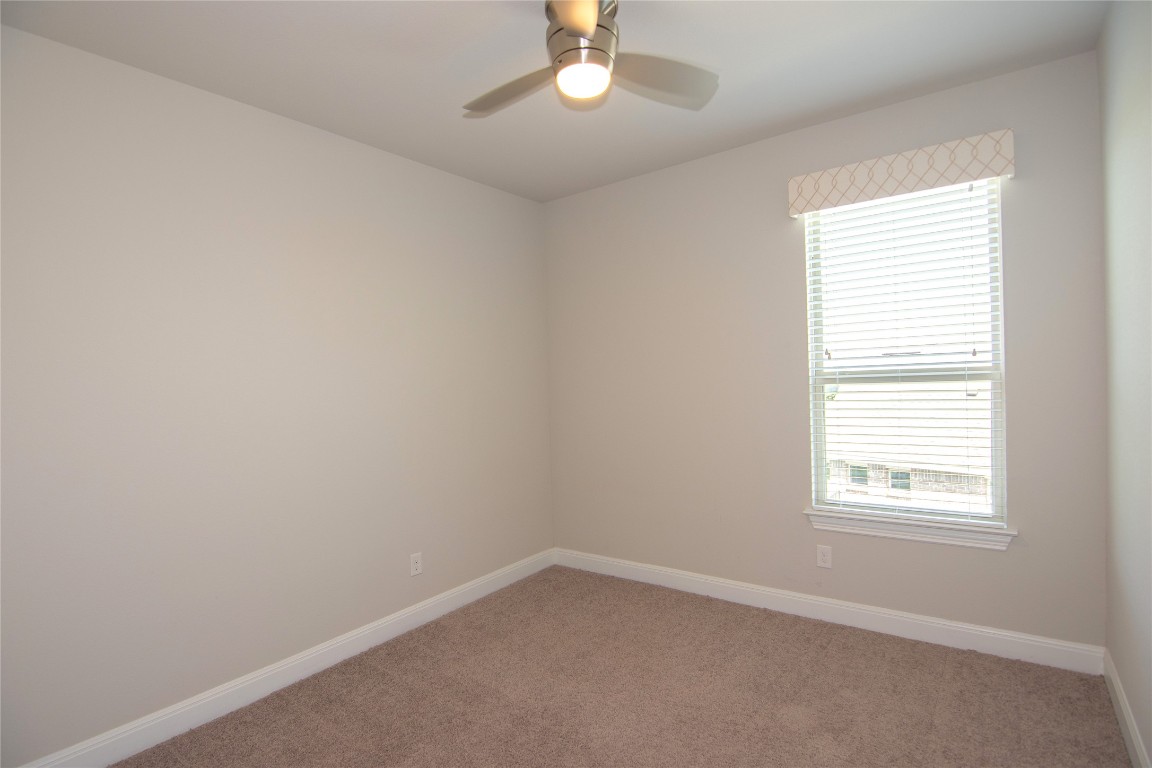 3901 Rhythmic Drive Pflugerville, TX 78660 - Photo 27 of 40 an empty room with a window