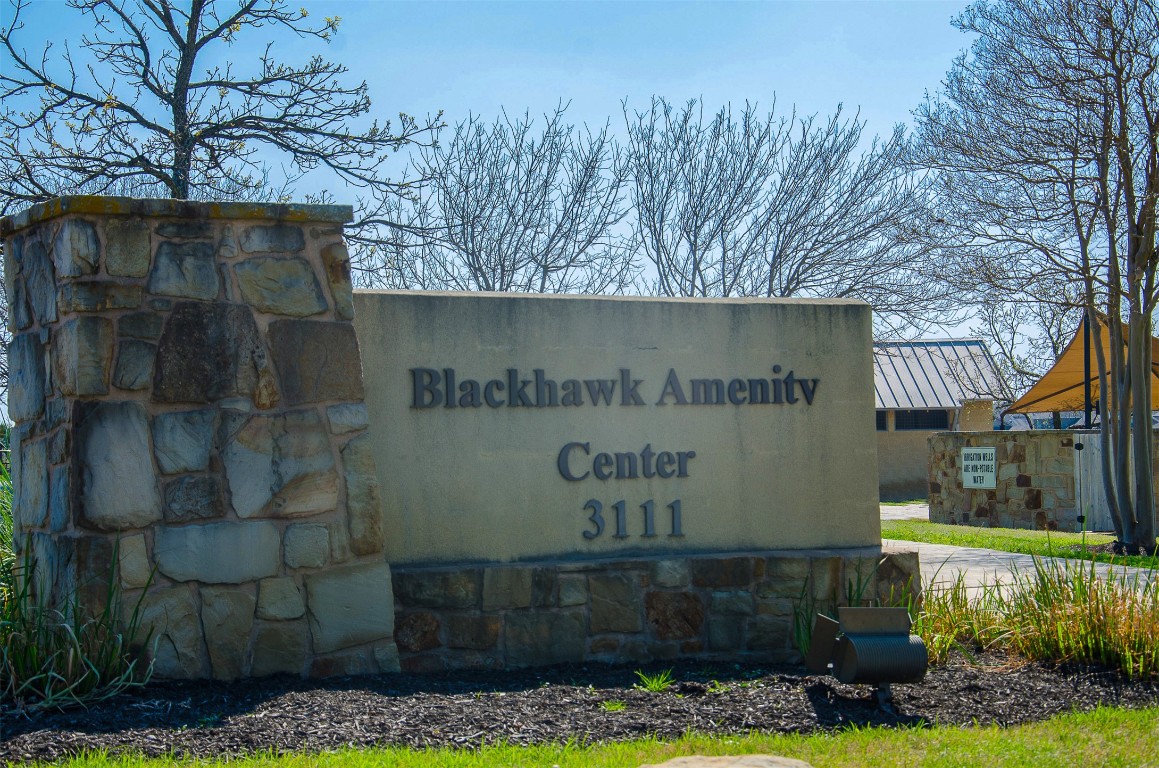 3901 Rhythmic Drive Pflugerville, TX 78660 - Photo 35 of 40 a sign on the side of a building