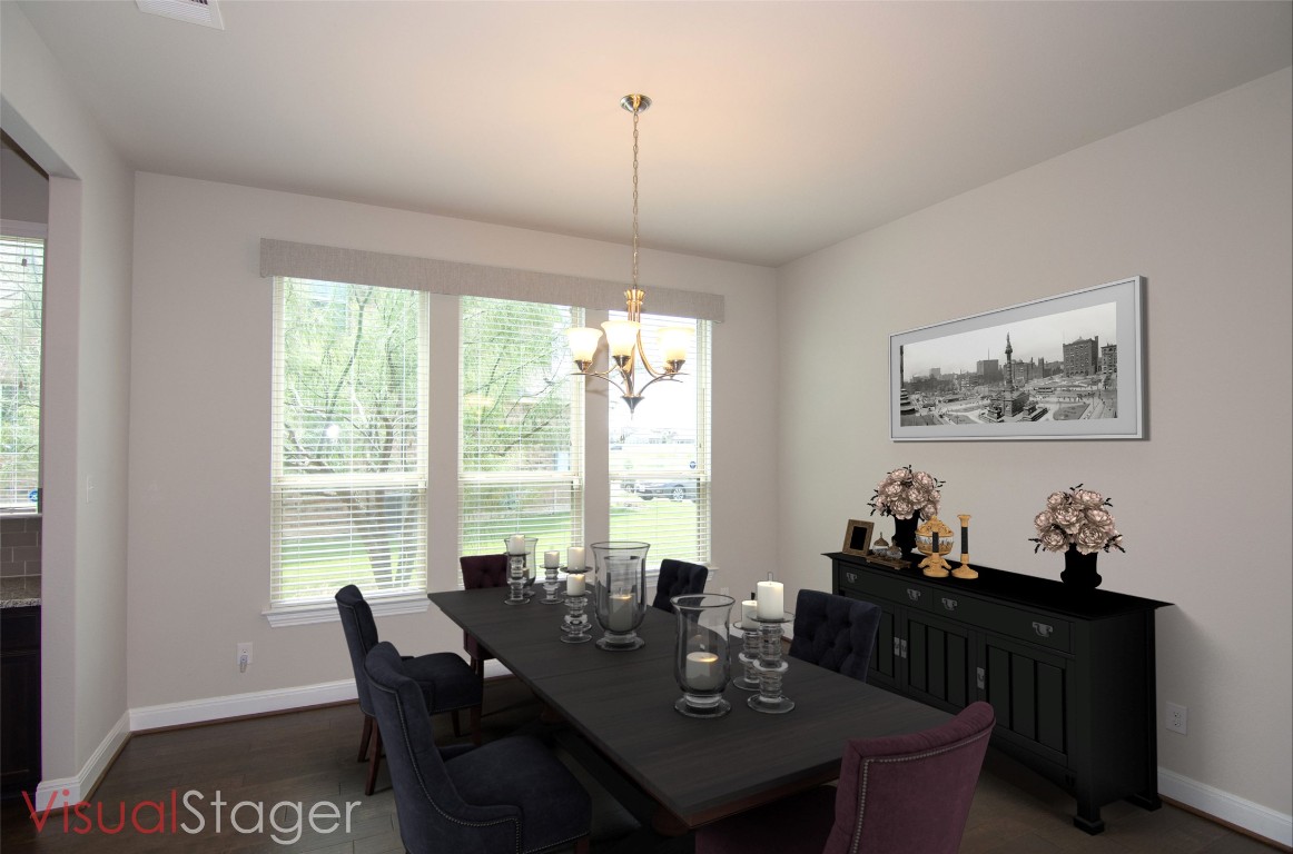 3901 Rhythmic Drive Pflugerville, TX 78660 - Photo 5 of 40 a view of a dining room with furniture window and outside view