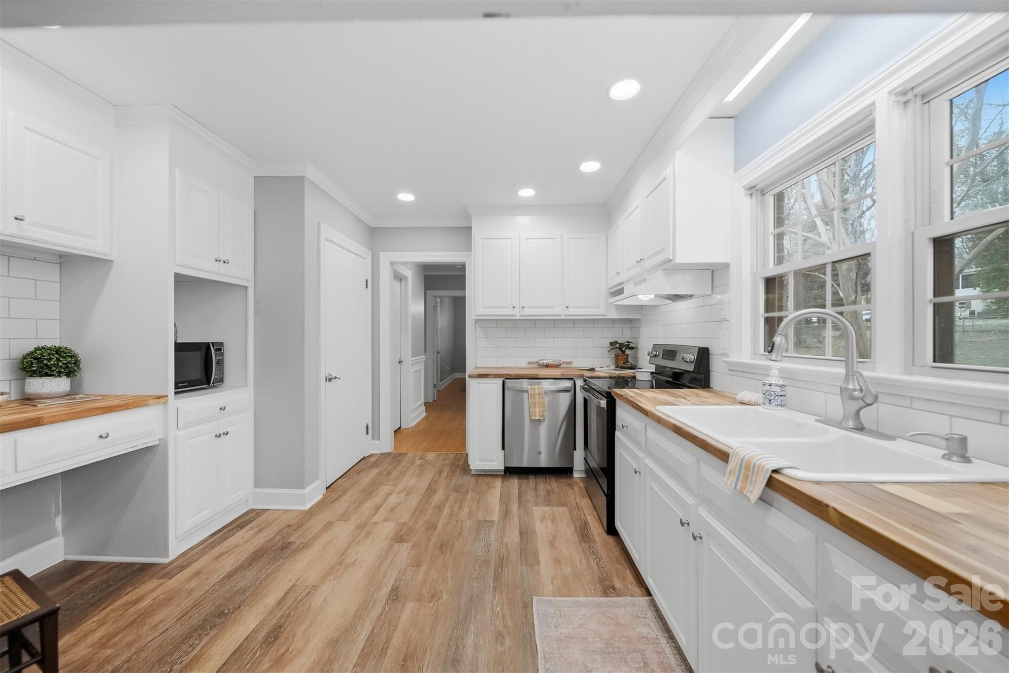 705 2nd Avenue Northeast Conover, NC 28613 - Photo 14 of 43 a large kitchen with a lot of counter space
